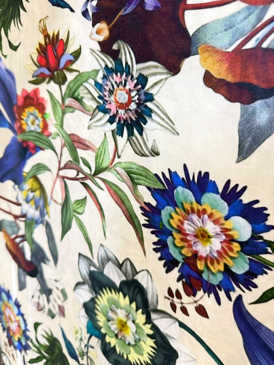 Multicolour flowers printed on cream fabric